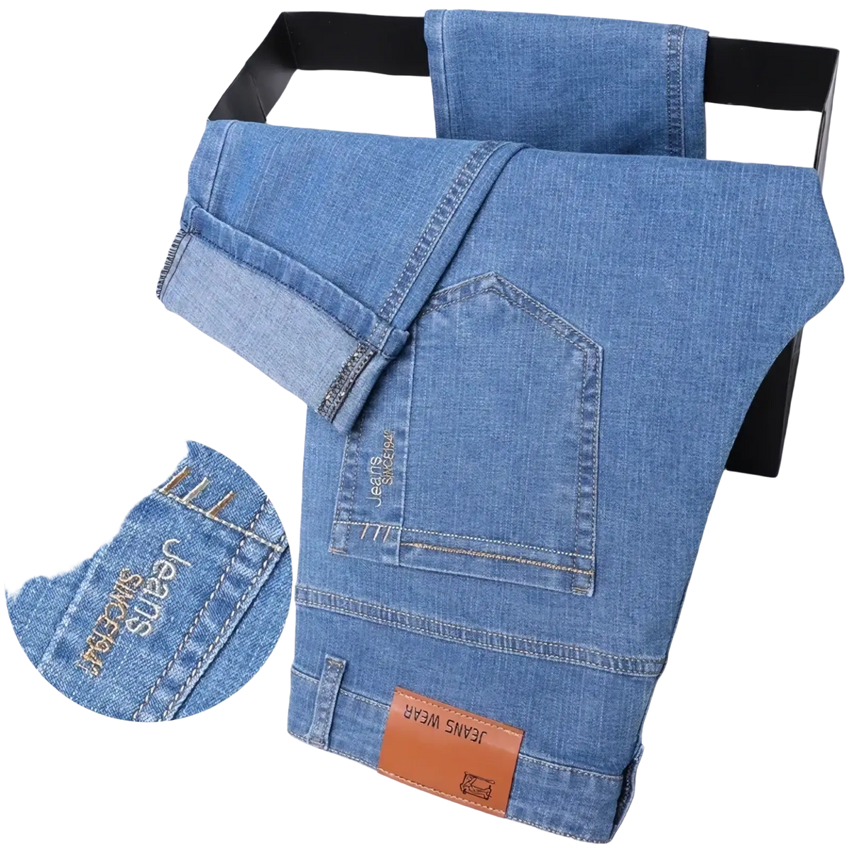 Men summer straight denim jeans in light-wash blue with slim fit, stitched branding, and brown leather waistband patch