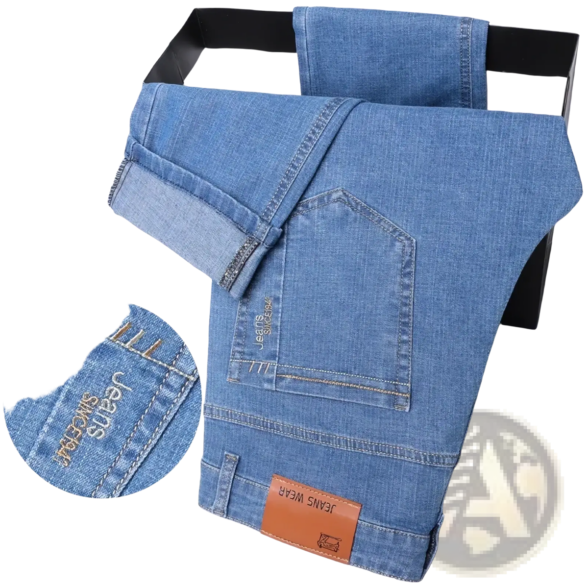 Men summer straight denim jeans in light-wash blue with slim fit, stitched branding, and brown leather waistband patch