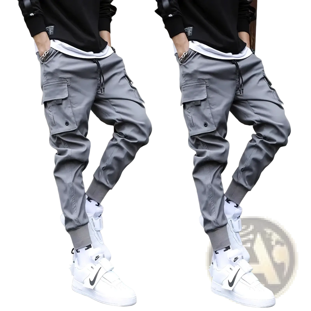 Men tactical cargo pants in gray with multiple pockets and a drawstring waistband for functional jogger style