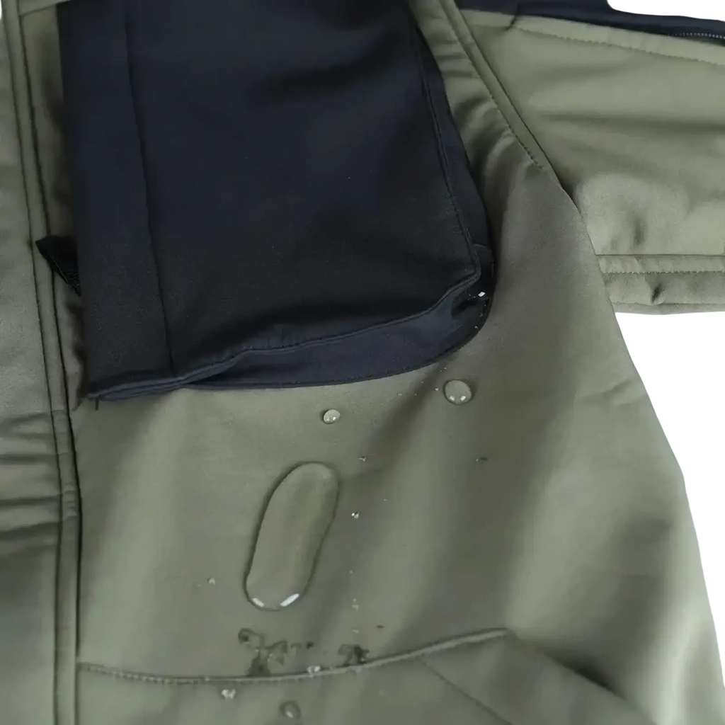 Men tactical waterproof soft shell jacket in olive green with black inner lining and water droplets on the fabric