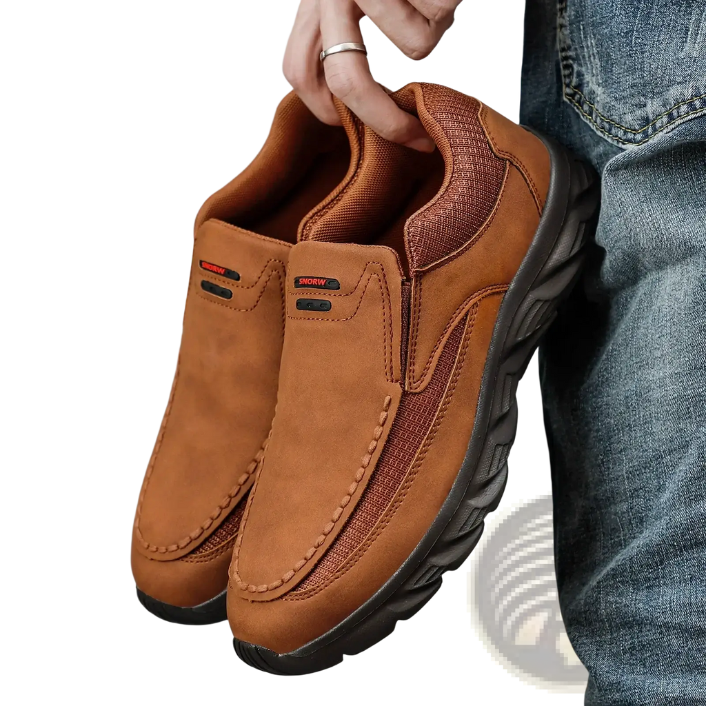 Men tan suede casual slip on shoes featuring brown suede with mesh panels and black rubber soles