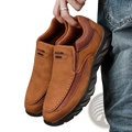 Men tan suede casual slip on shoes featuring brown suede with mesh panels and black rubber soles