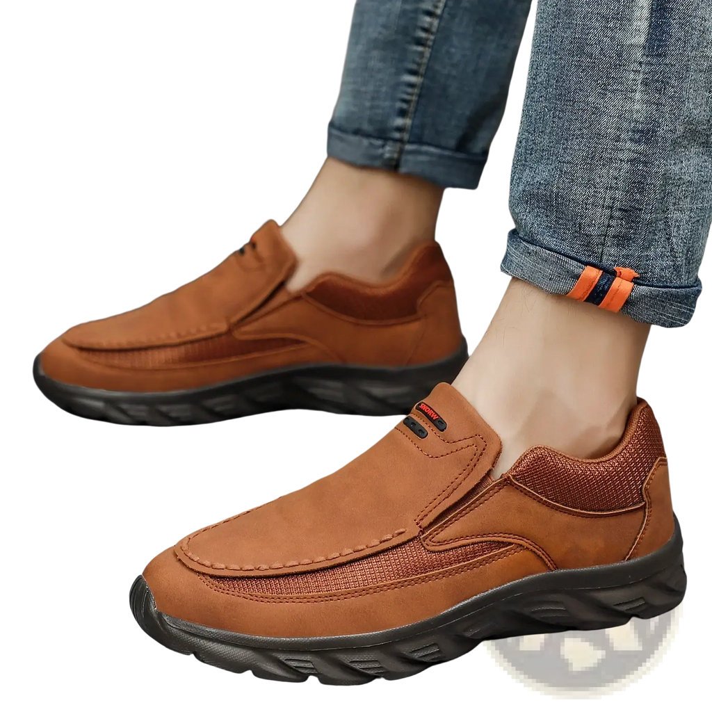 Men tan suede casual slip on shoes featuring brown suede with a textured mesh panel and black rubber sole