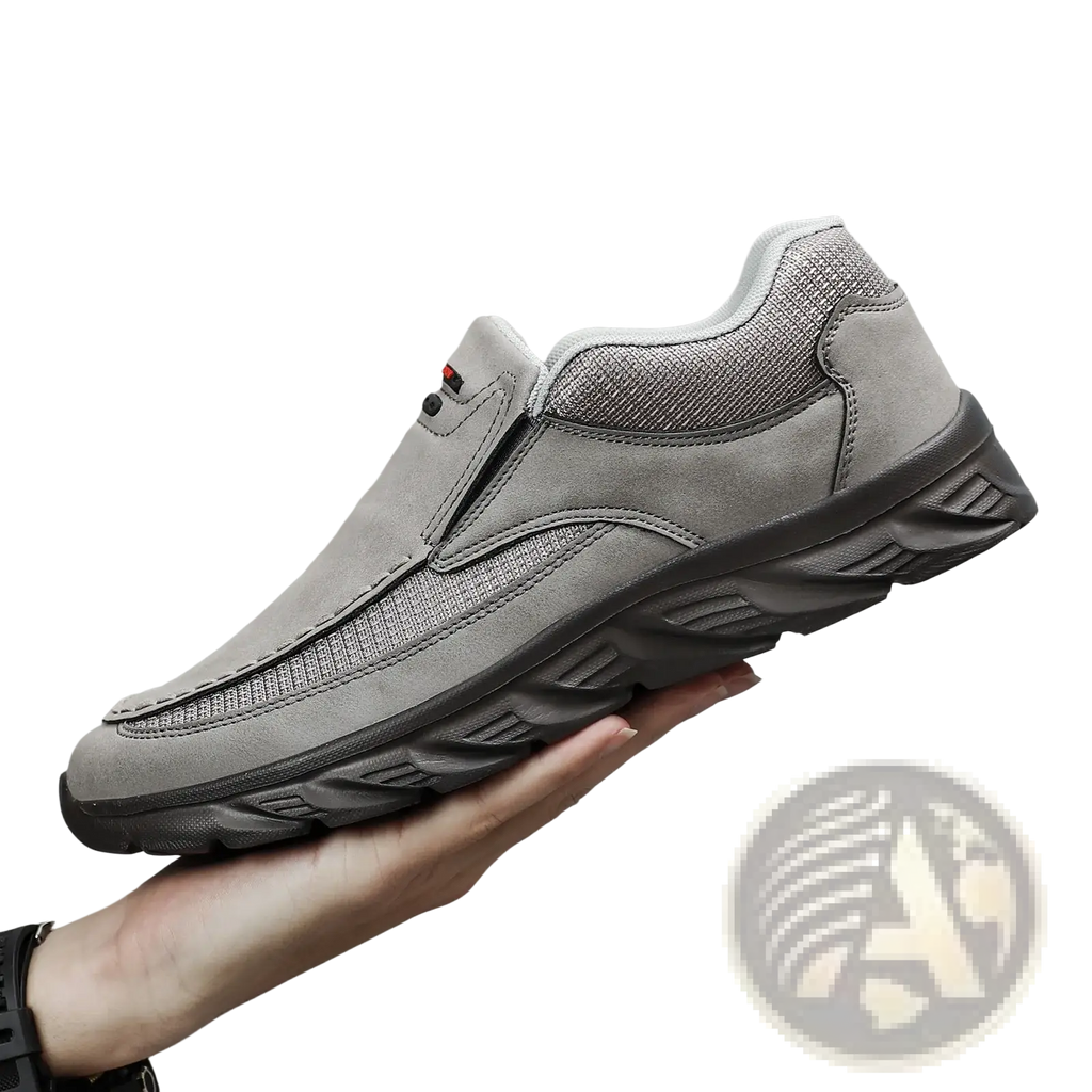 Men tan suede casual slip on shoe with gray suede and mesh upper and black rubber sole for everyday wear