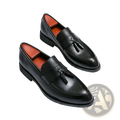 Men tassel loafers classic leather dress shoes in black with polished finish and contrasting orange interior lining