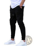 Men terry cloth jogger pants in black with drawstring waist tapered fit and ribbed cuffs for casual streetwear use