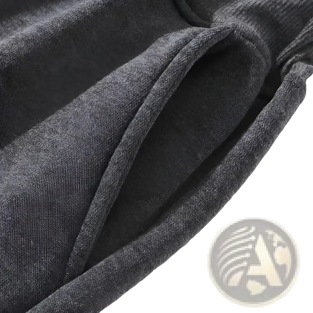 Men terry cloth jogger pants in soft heather gray ribbed knit fabric featuring casual streetwear style and gentle folds