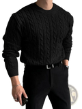 Black thick cable knit sweater for men with ribbed crew neck and cuffs made from warm material