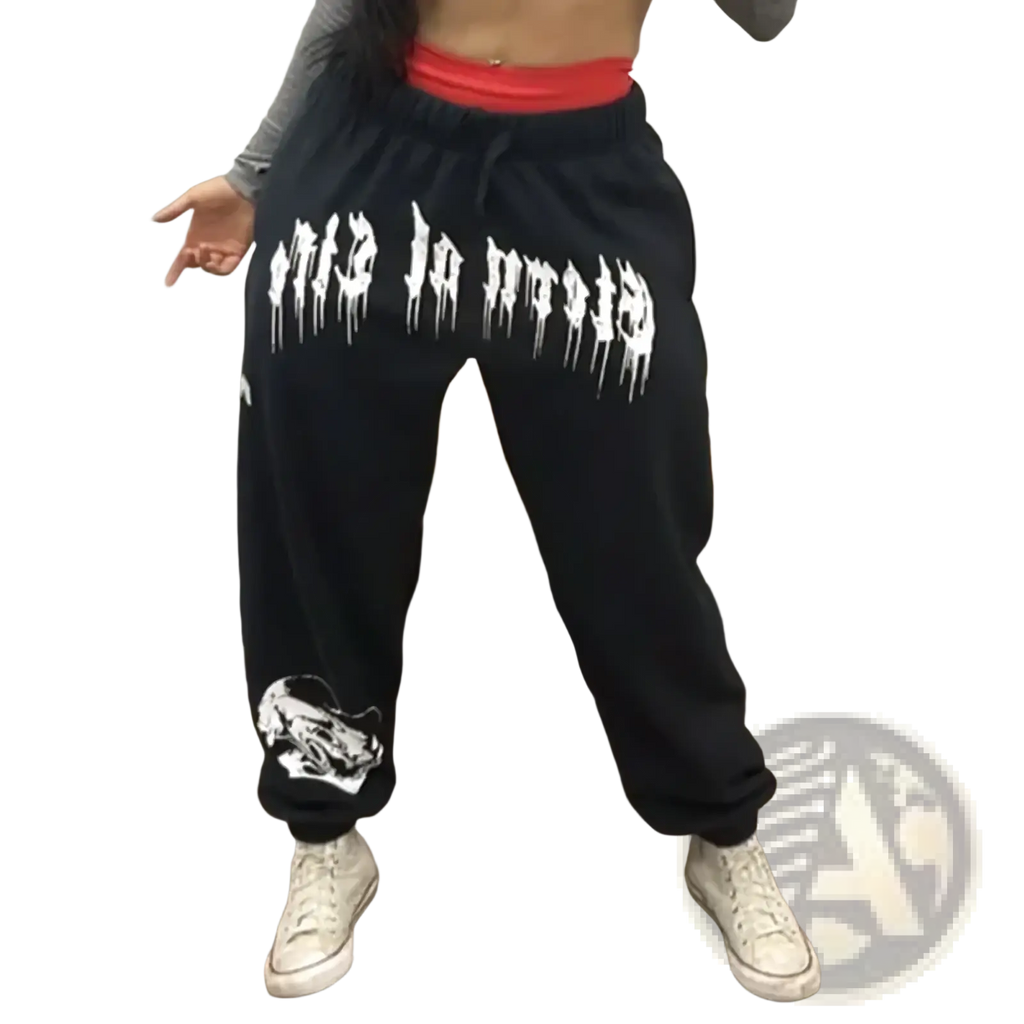 Men training pants graphic sweatpants in black with white dripping lettering and a white tiger print on the leg