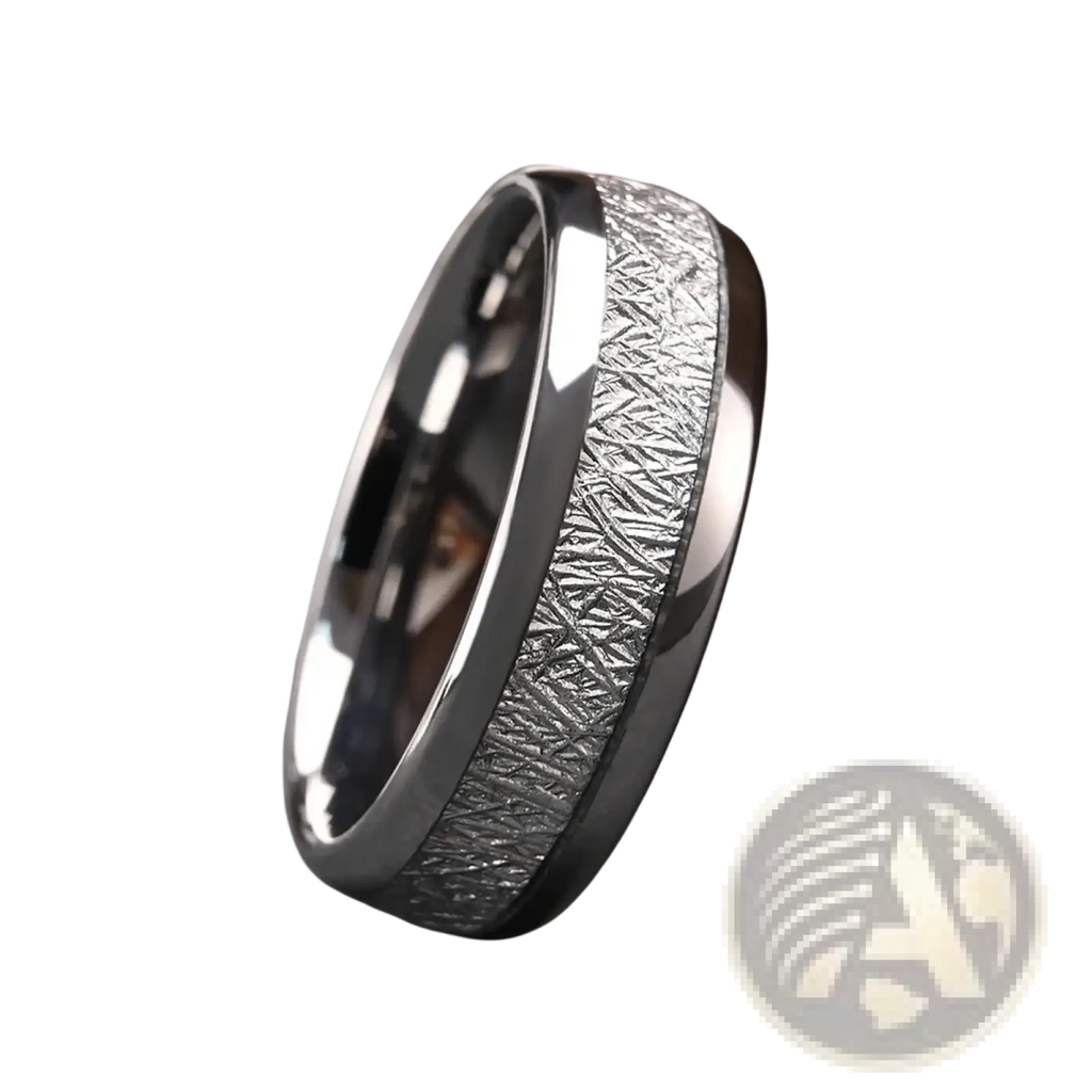 A sleek black tungsten men wedding band featuring a textured silver-toned meteorite inlay ring