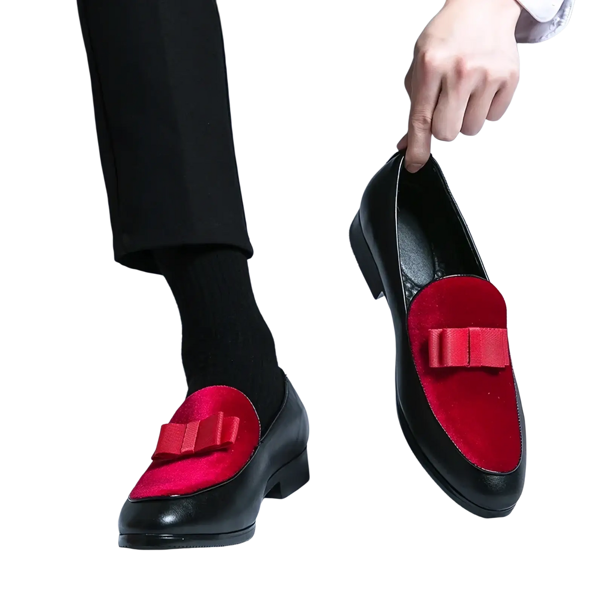 Men velvet dress loafers made of black leather with vibrant red suede accents and matching bow details for formal wear
