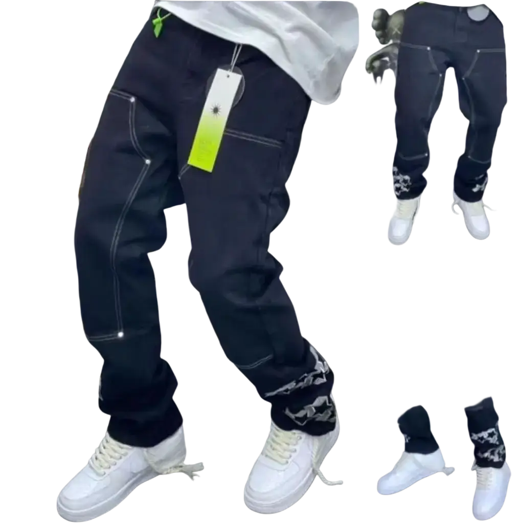 Men vintage bell bottom jeans in black distressed denim with white stitching and patterned cuffs