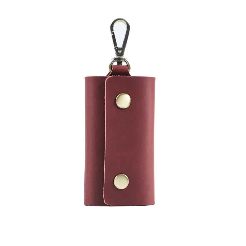 Men’s minimalist leather wallet and key organizer case in sleek burgundy leather with gold snap buttons and silver carabiner clip