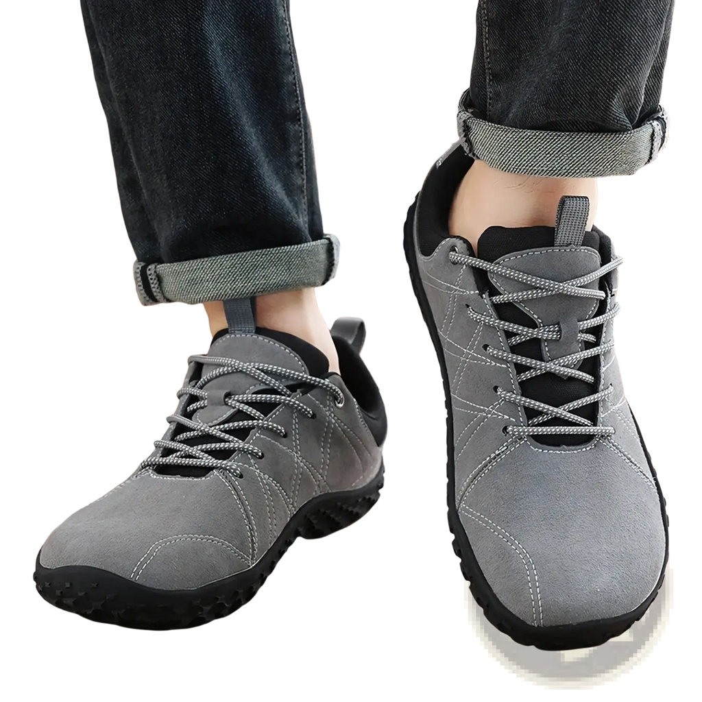 Men waterproof leather hiking shoes in gray suede with black rubber soles and reinforced stitching for durability