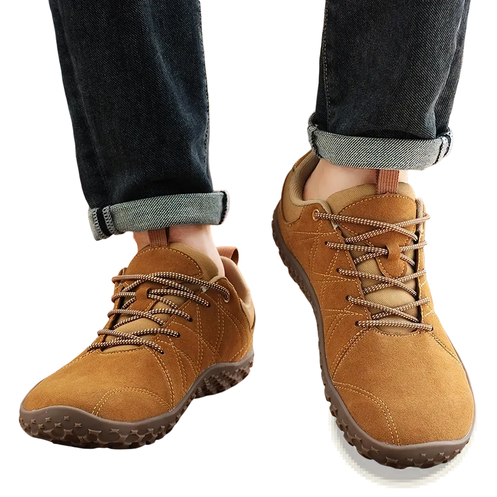Men waterproof leather hiking shoes in tan suede with brown laces and textured rubber sole for rugged outdoor use