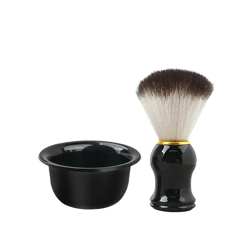 Men wet shaving kit featuring a black ceramic shaving bowl and gold-accented shaving brush with two-toned bristles