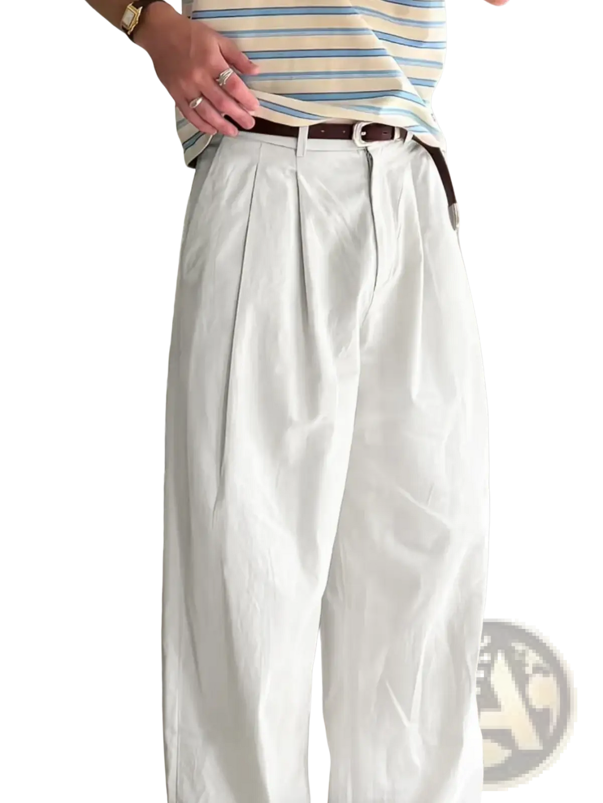 Men white pleated wide leg suit pants featuring a front pleat and brown belt for formal wear