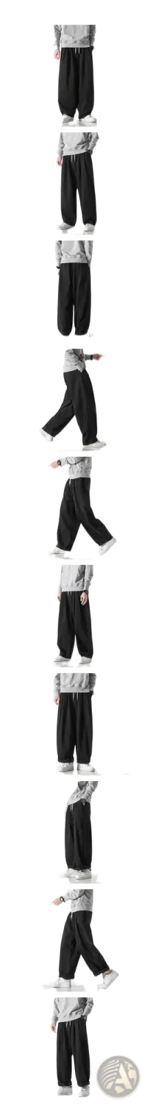 Men wide leg denim jeans in black with a relaxed flowing silhouette and subtle side pockets for hip hop style