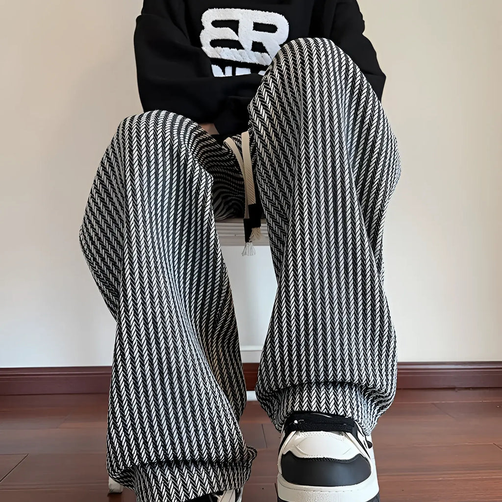 Men wide leg herringbone drawstring trousers in black and white pattern with comfortable loose fit