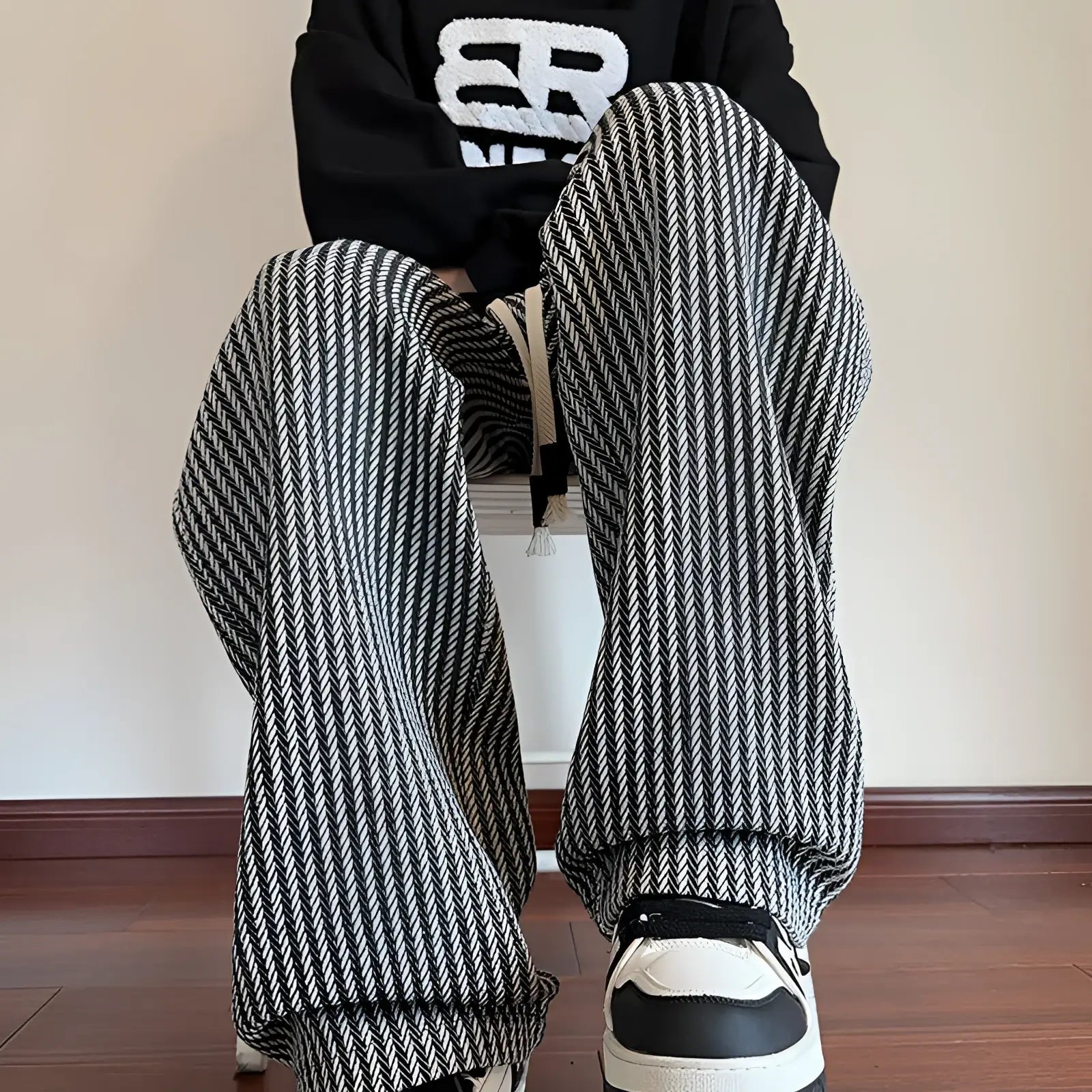Men wide leg herringbone drawstring trousers in black and white pattern with comfortable loose fit
