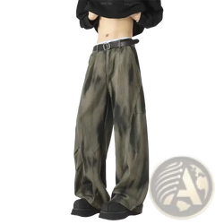 Men wide leg tie dye denim jeans in olive green with a black belt showcasing a modern casual style