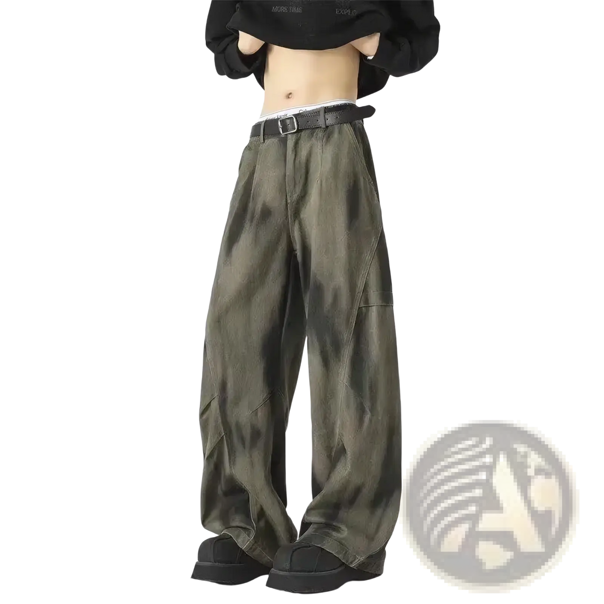 Men wide leg tie dye denim jeans in olive green with a black belt showcasing a modern casual style