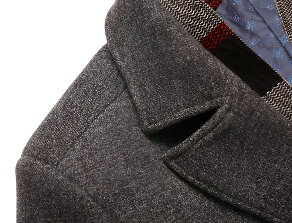 Textured charcoal gray wool overcoat with classic notched lapel and plaid lining for winter use