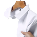 White cotton wrinkle-resistant short sleeve button-up business shirt with subtle y landun logo embroidered on chest