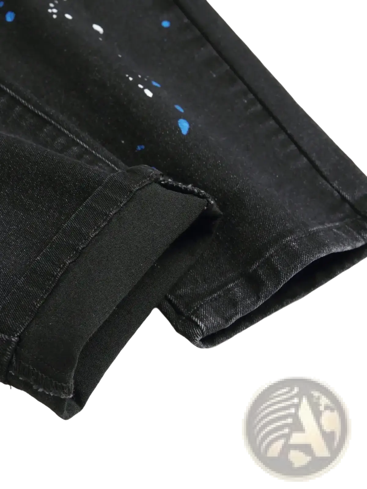 Men y2k stretchy skinny ripped black denim jeans with distressed blue and white paint splatter design