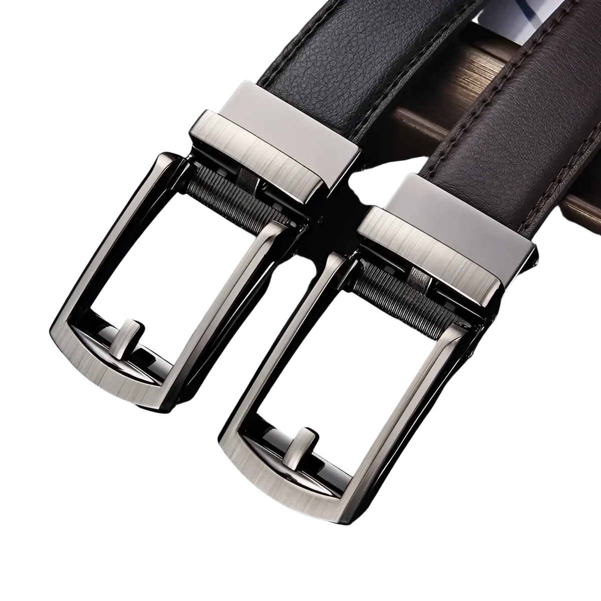 Two sleek silver-toned automatic belt buckles with black leather straps for mens automatic leather belts