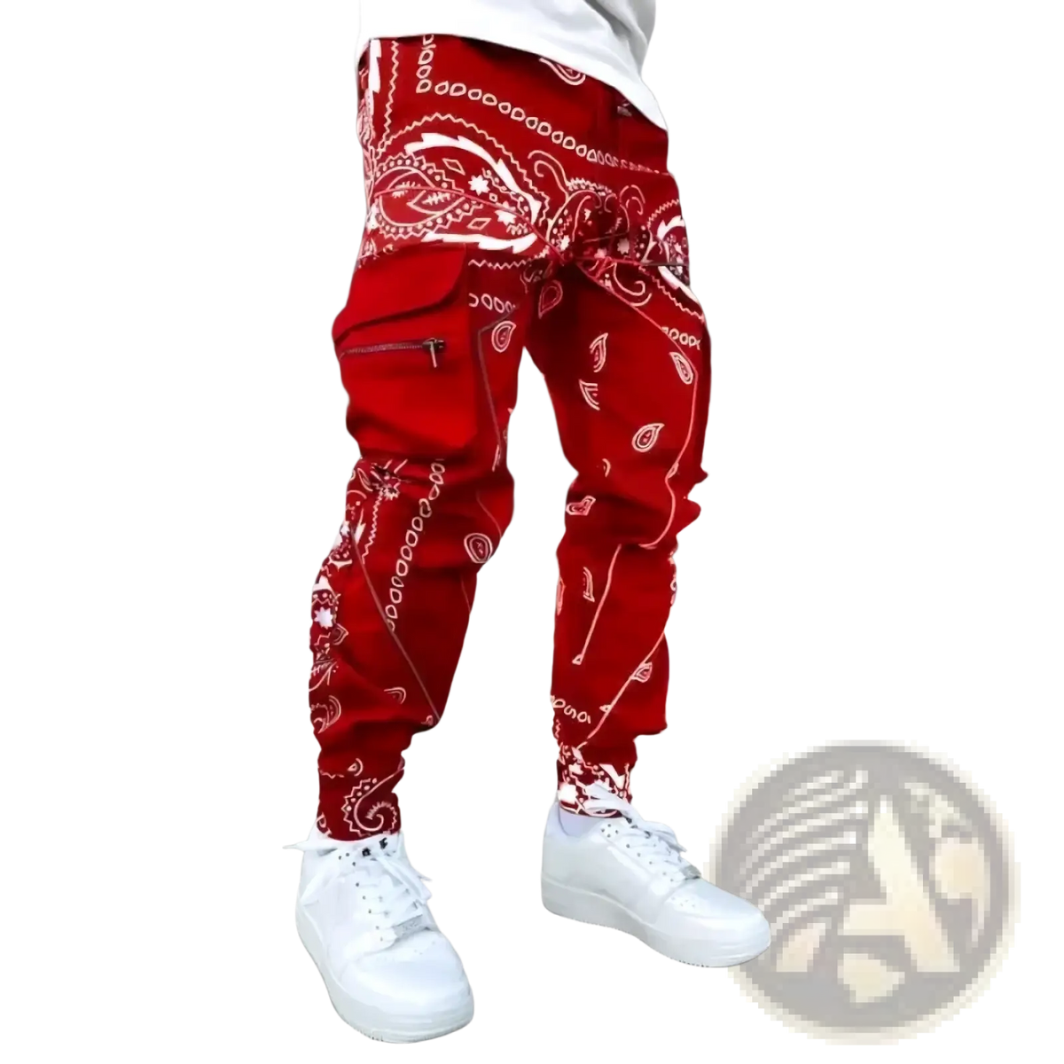Men’s bandana print loose cargo pants in red with white paisley designs and multiple pockets for utility wear