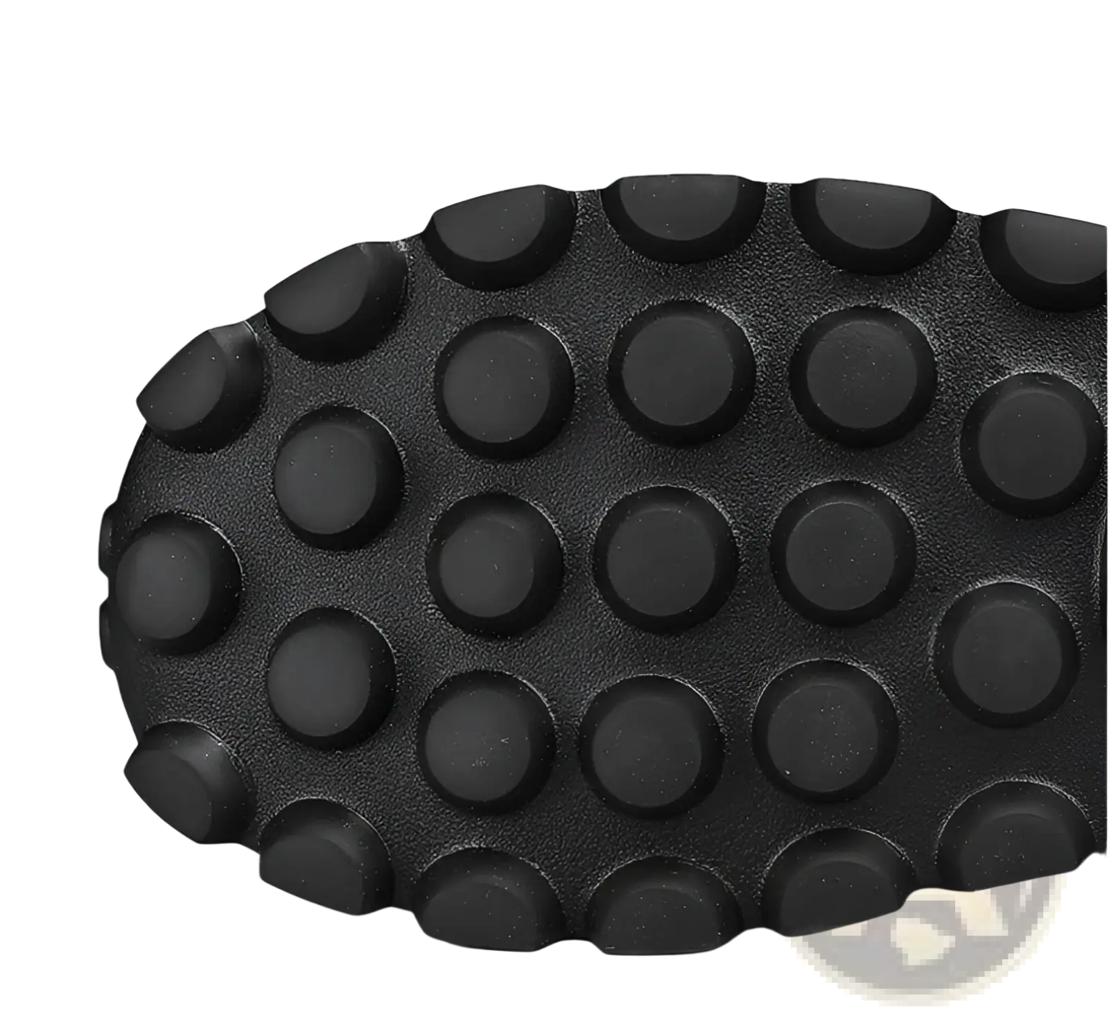 Black rubber sole with a pattern of raised circular studs on men’s black crocodile embossed leather sneakers