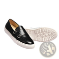 Men’s black leather slip-on loafers with silver buckle detailing and a white rubber sole for formal wear