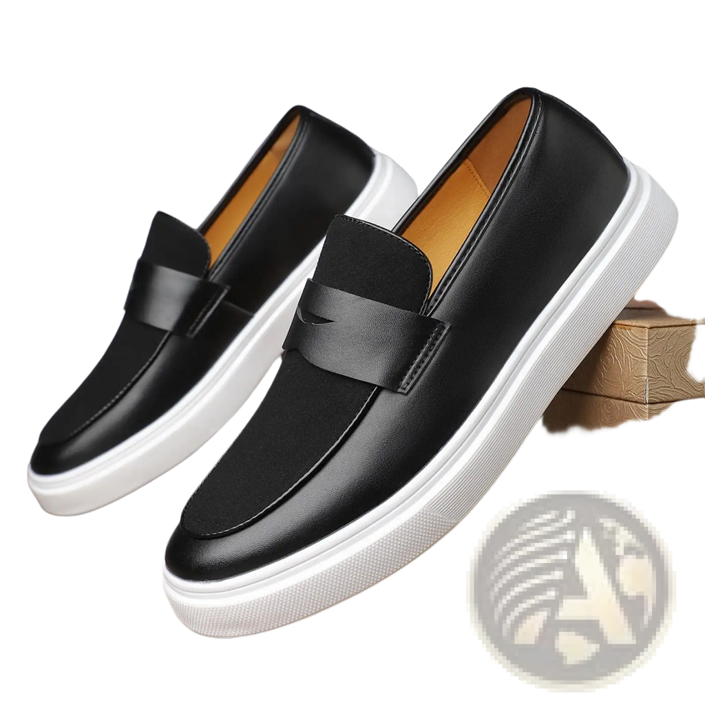 Men’s black leather slip-on loafers featuring a white rubber sole and contrasting tan interior for casual wear