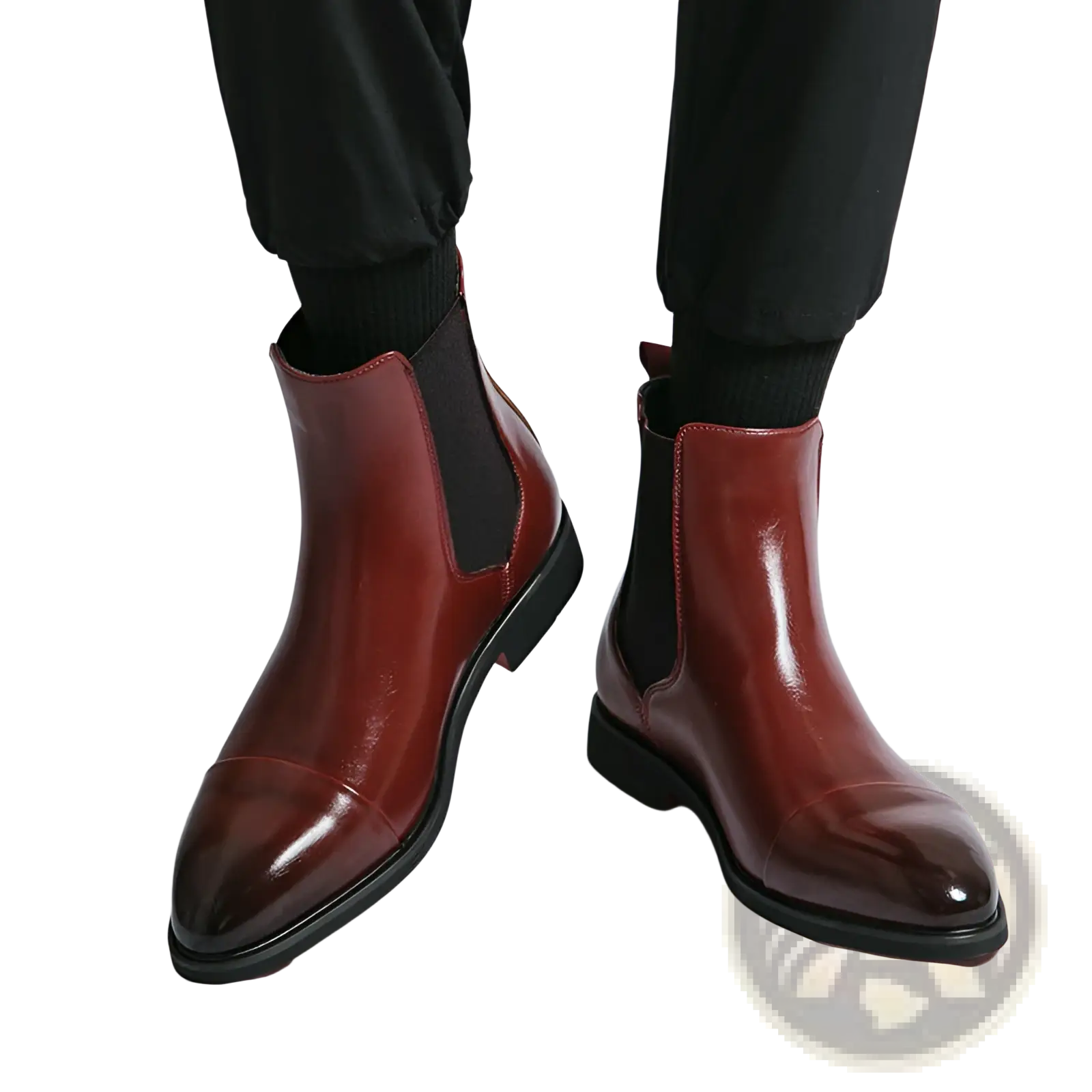 Men’s polished burgundy leather chelsea boots with black elastic panels and sleek pointed toe design