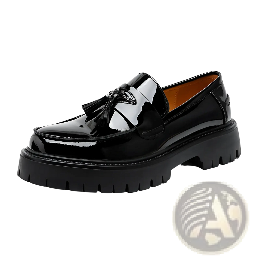 Men’s black patent leather tassel loafer with chunky textured sole suitable for formal and casual wear