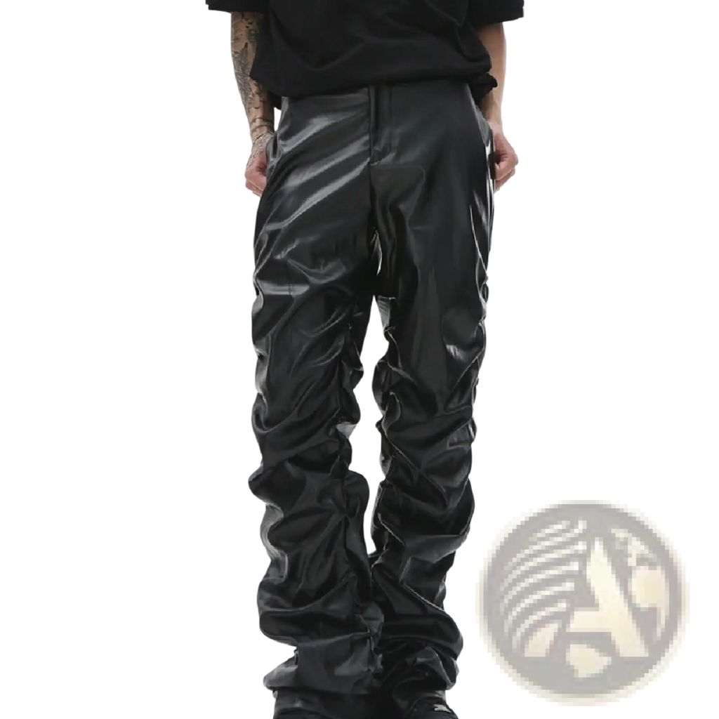 Men’s black ruched glossy faux leather tapered pants featuring a slouchy and tapered design in synthetic leather