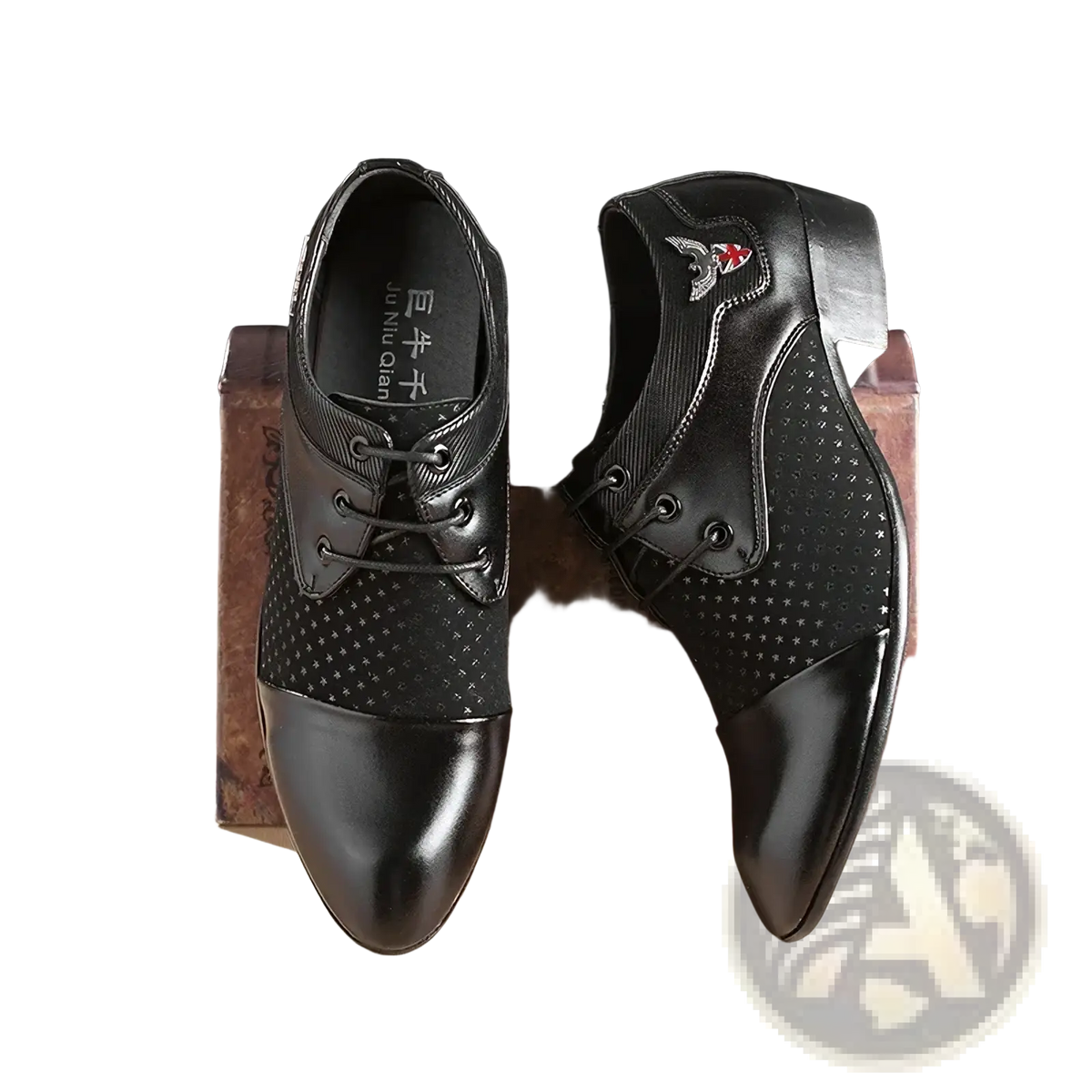 Mens black leather oxford dress shoes with glossy toe cap, perforated side panels, and embroidered bird emblem