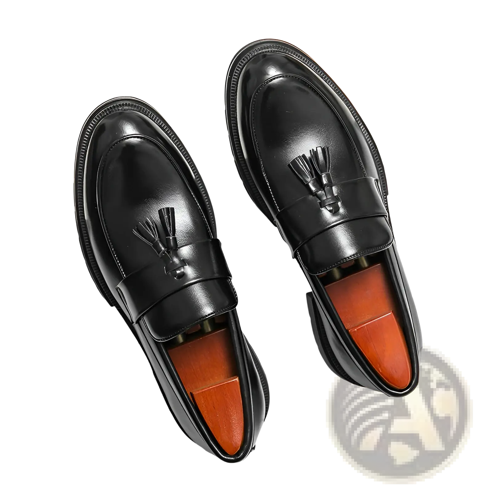 Men’s black leather tassel loafers with breathable orange insole and glossy brogue detailing for formal wear