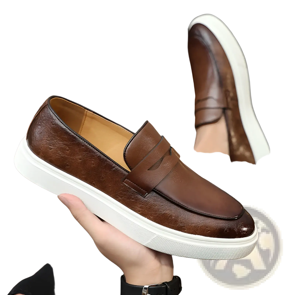 Men’s British style embossed brown leather loafers with textured surface and white rubber soles