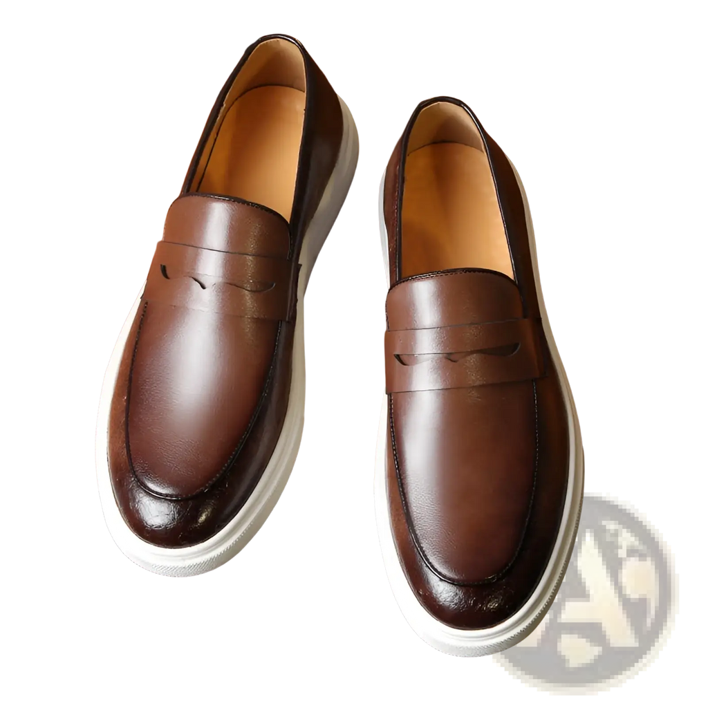 Men’s British style embossed brown leather loafers with white rubber sole and decorative stitching