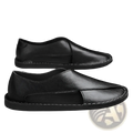 Men’s black genuine leather slip-on shoes with minimalist design and white stitching along the edges