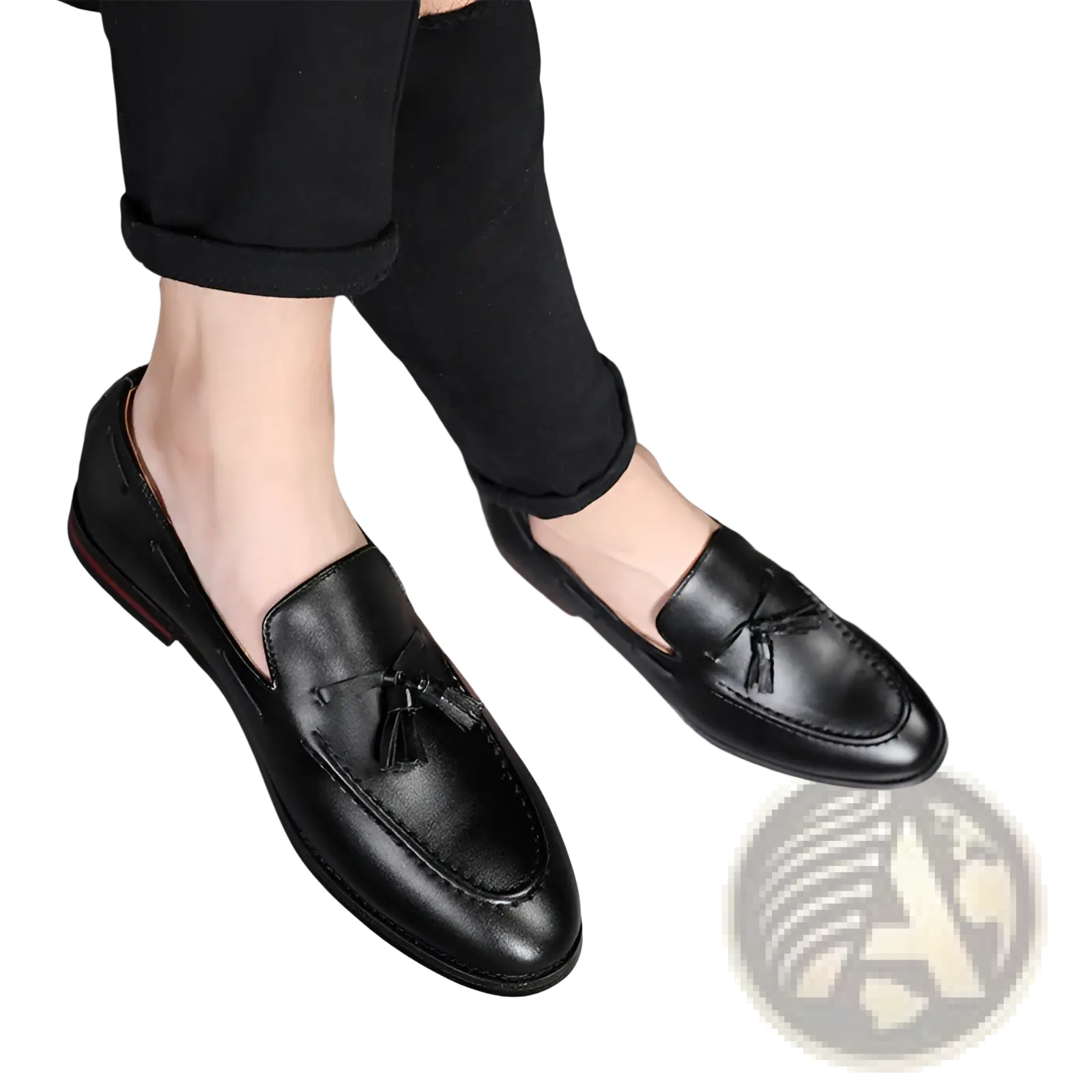 Men’s black leather tassel loafers with polished finish and subtle stitching details in formal style