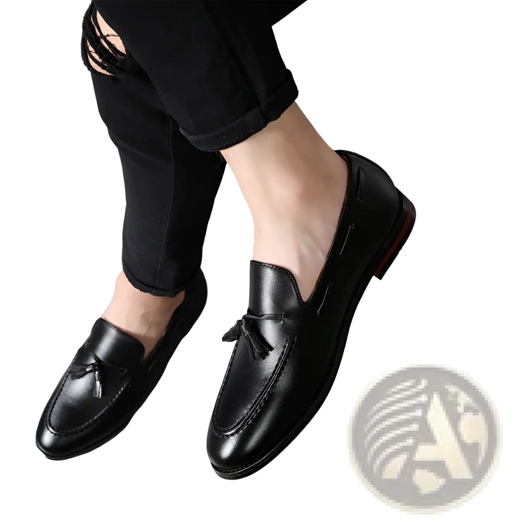Men’s black leather tassel loafers with polished finish and subtle stitching details for formal wear