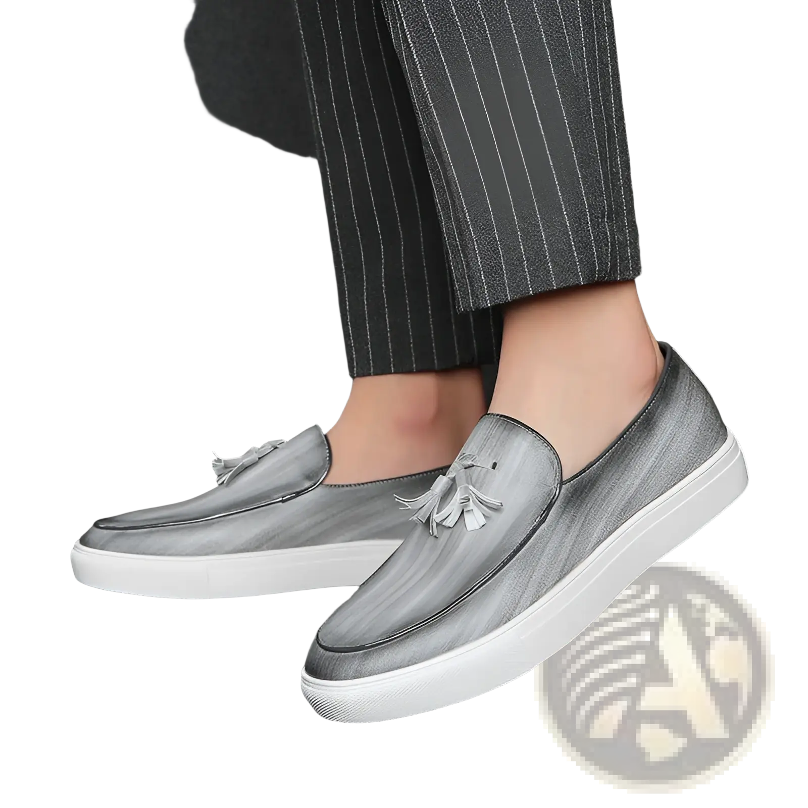 Men’s gray leather slip-on loafers with white rubber soles and decorative tassels on the vamp