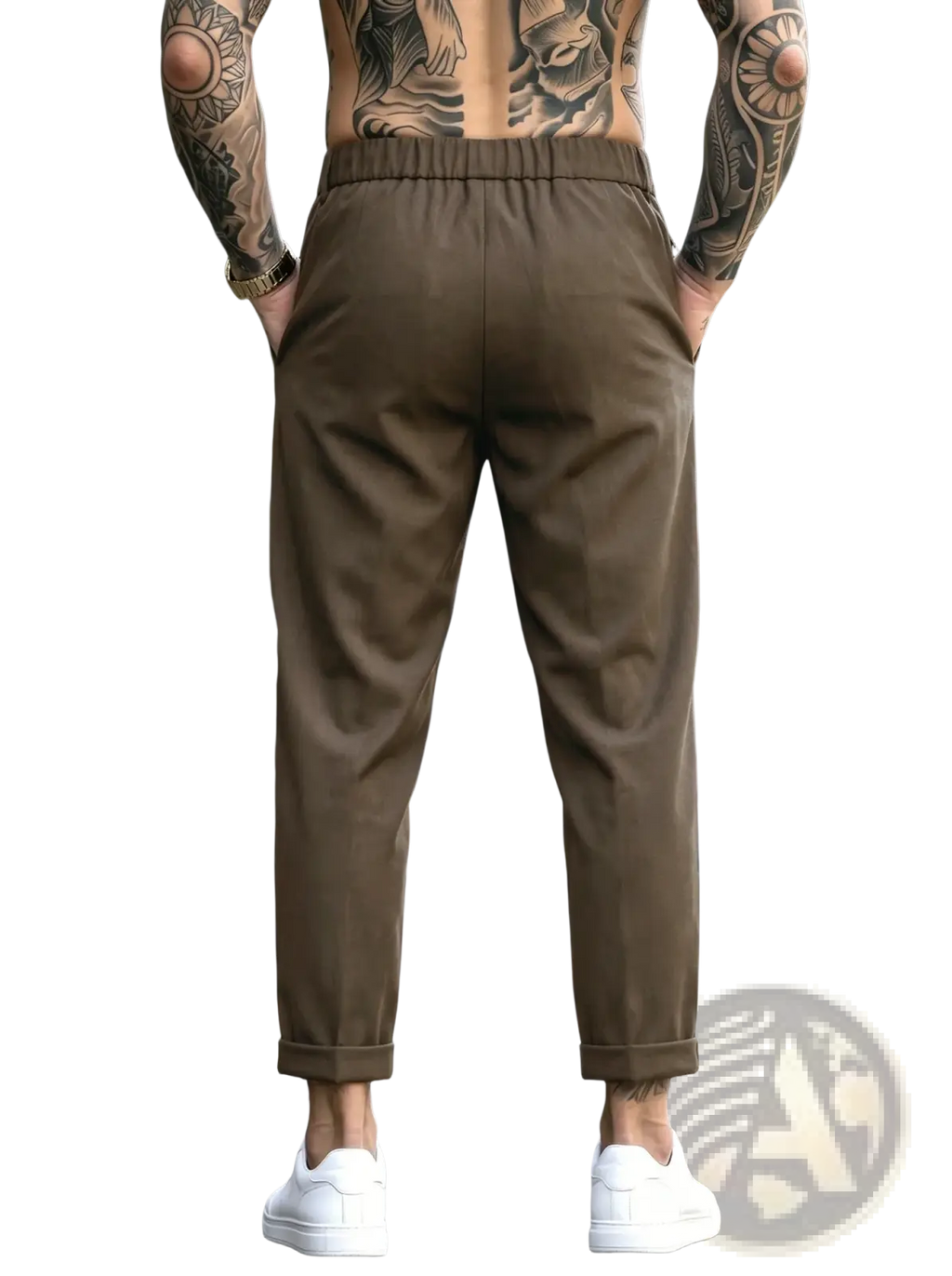 Men’s brown pleated tapered suit pants with elastic waistband and rolled cuffs made from soft fabric