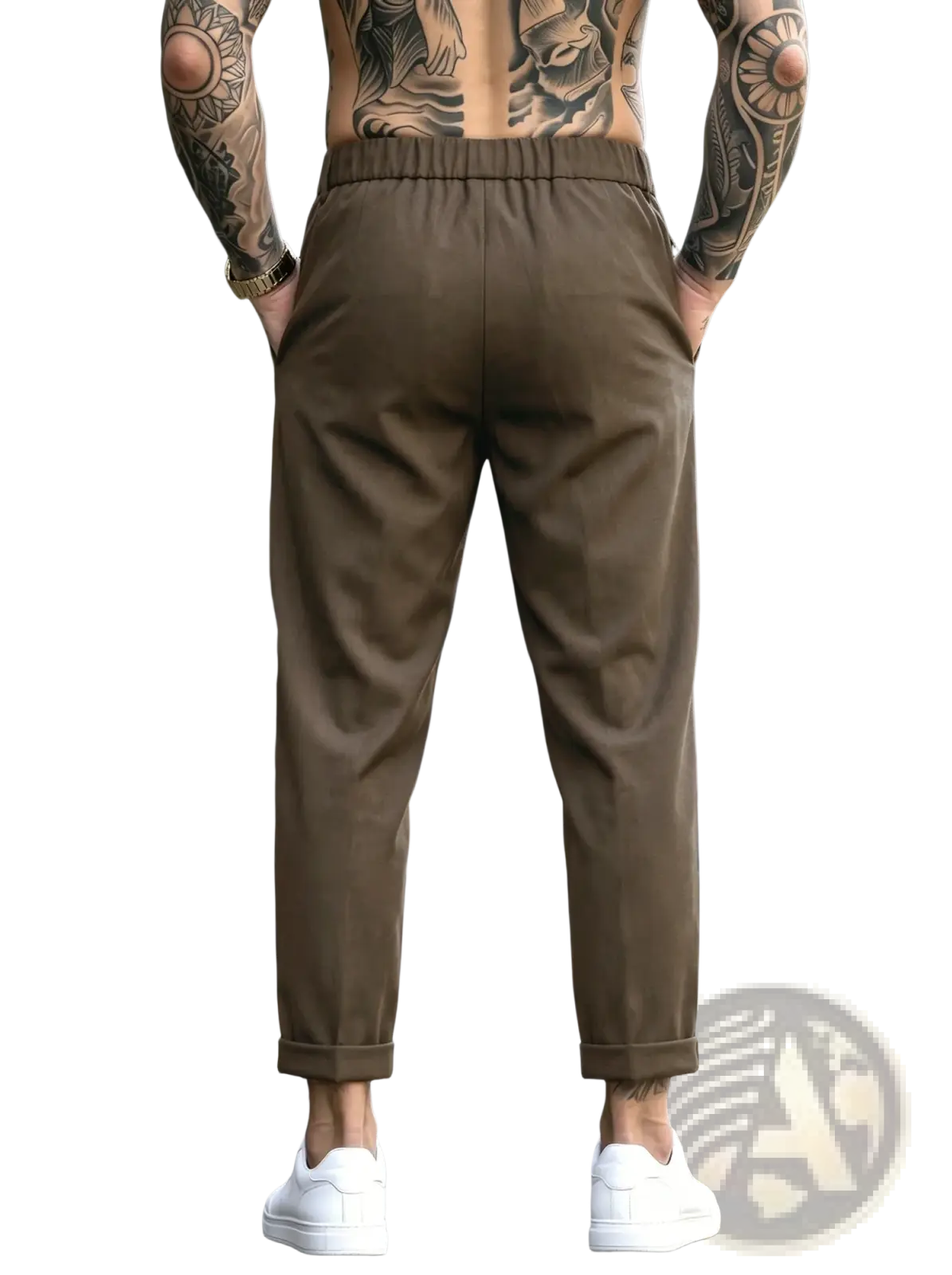 Men’s brown pleated tapered suit pants with elastic waistband and rolled cuffs made from soft fabric
