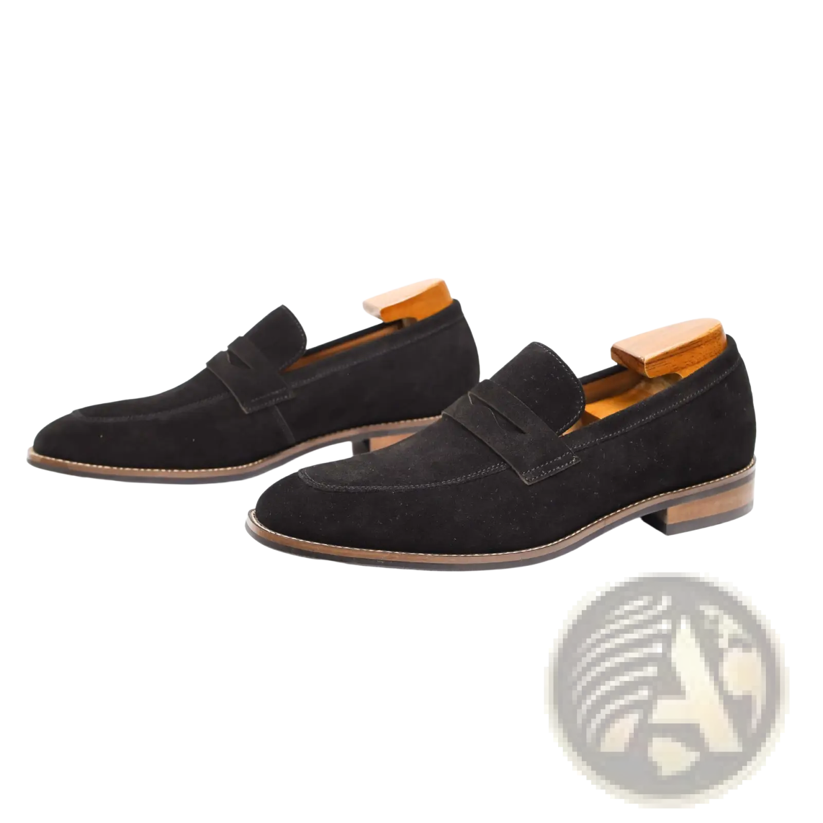 Men’s black suede loafers with classic slip-on design and contrasting tan leather soles for casual wear