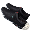 Men’s black leather slip-on loafers with white stitching and subtle textured upper for business casual wear