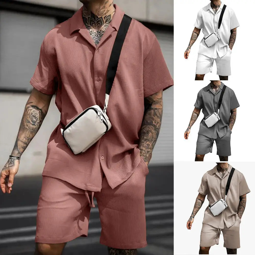 White crossbody bag with black strap and zipper closure paired with men’s casual cotton polo and shorts summer set